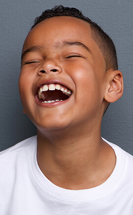 Young boy laughing